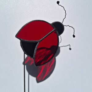 Coccinelle sur tige
